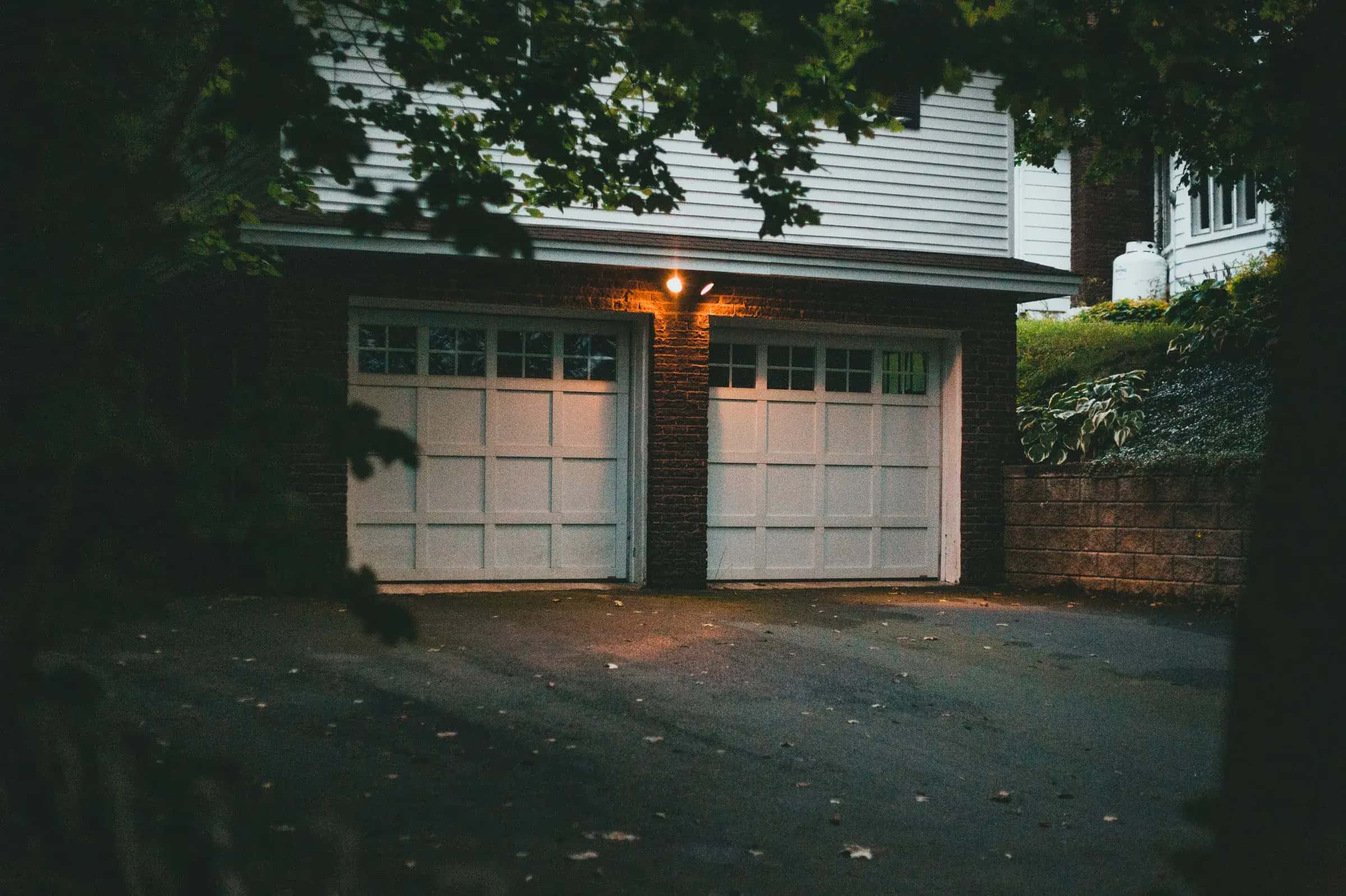 Two-car attached garage on a detached suburban house - a common garage-conversion ADU candidate, Ontario, Canada